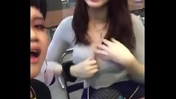 Play Thai girl gets her boob exposed in public